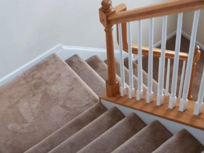 The Pros and Cons of Using Carpet on Your Stairs Explained